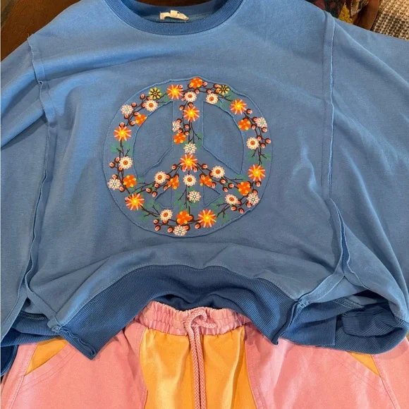 Easel Blue Top with Vibrant Floral Peace Sign Design - Picture 10 of 12